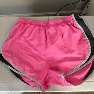 Pink Nike running shorts - size medium